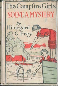 Book cover of "The Camp Fire Girls Solve a Mystery; Or, The Christmas Adventure at Carver House"